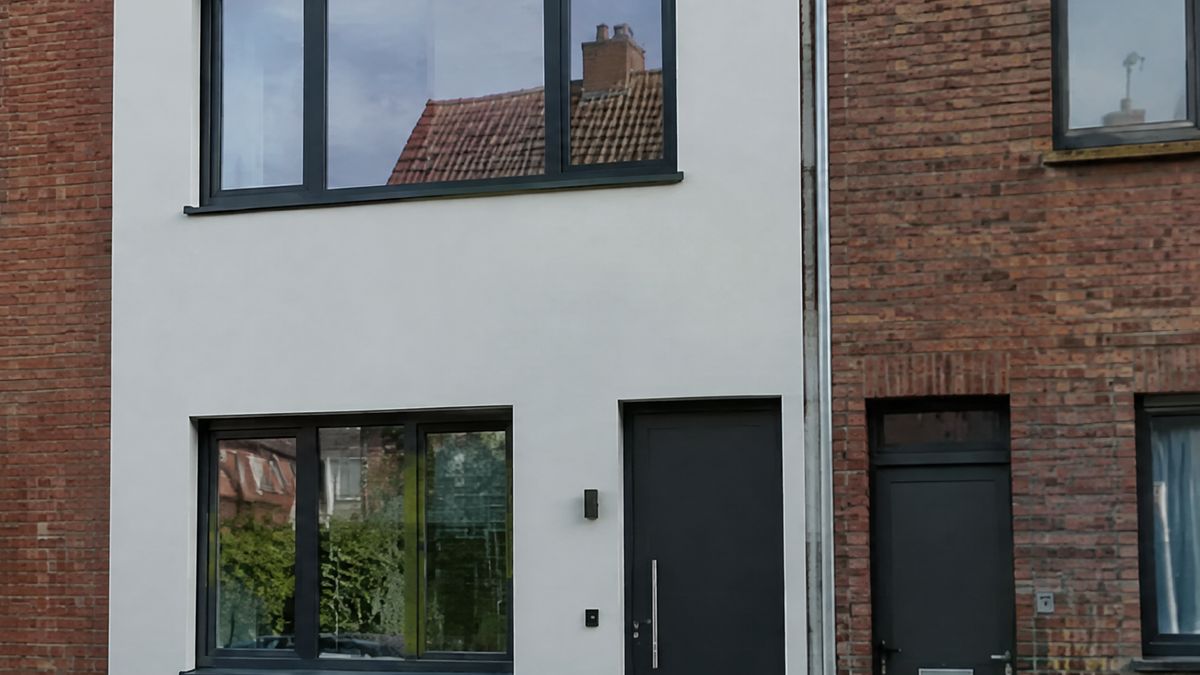 Woning in een Vlaamse rijwoningstraat (illustratieve foto)
